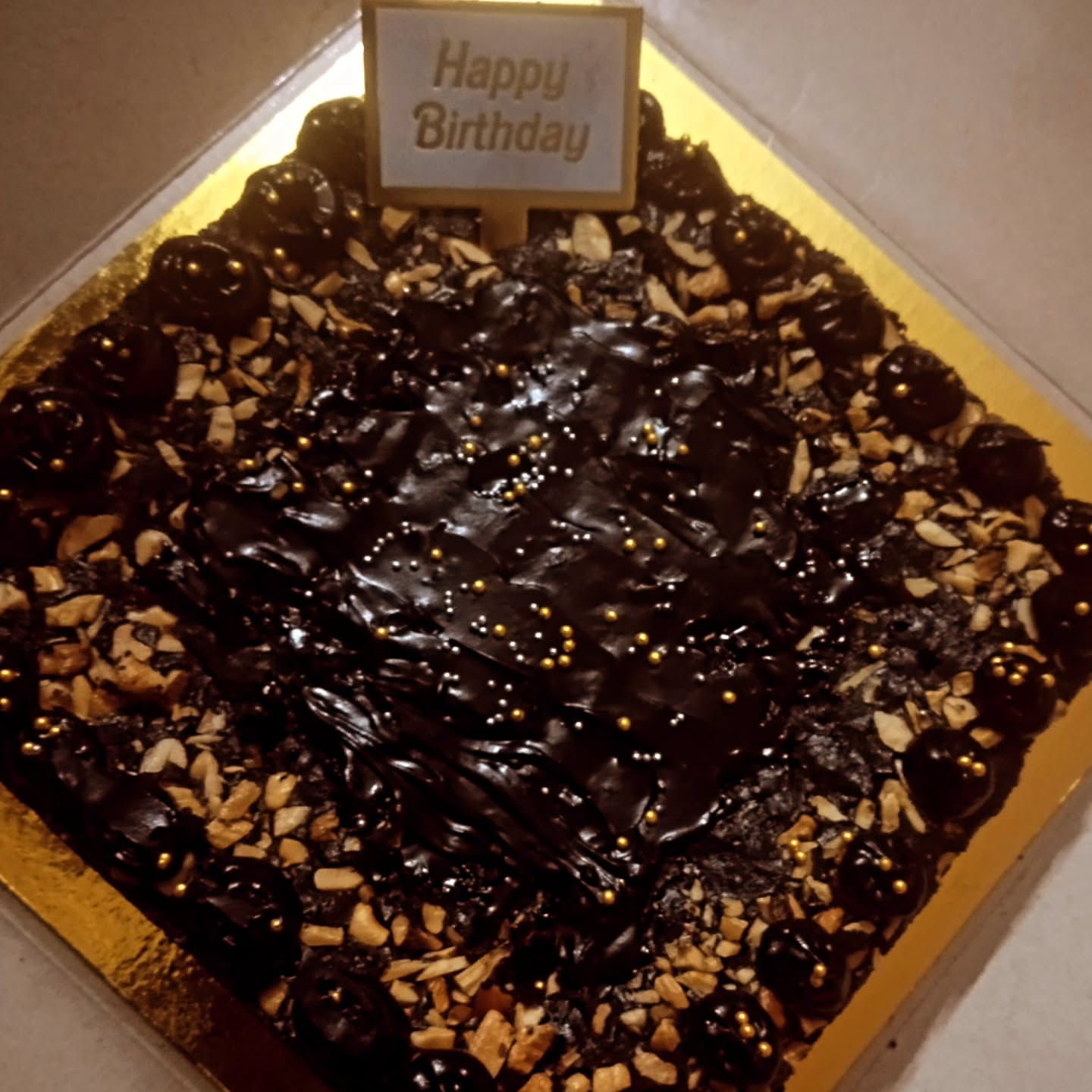 Celebration brownie slab with a Happy Birthday topper