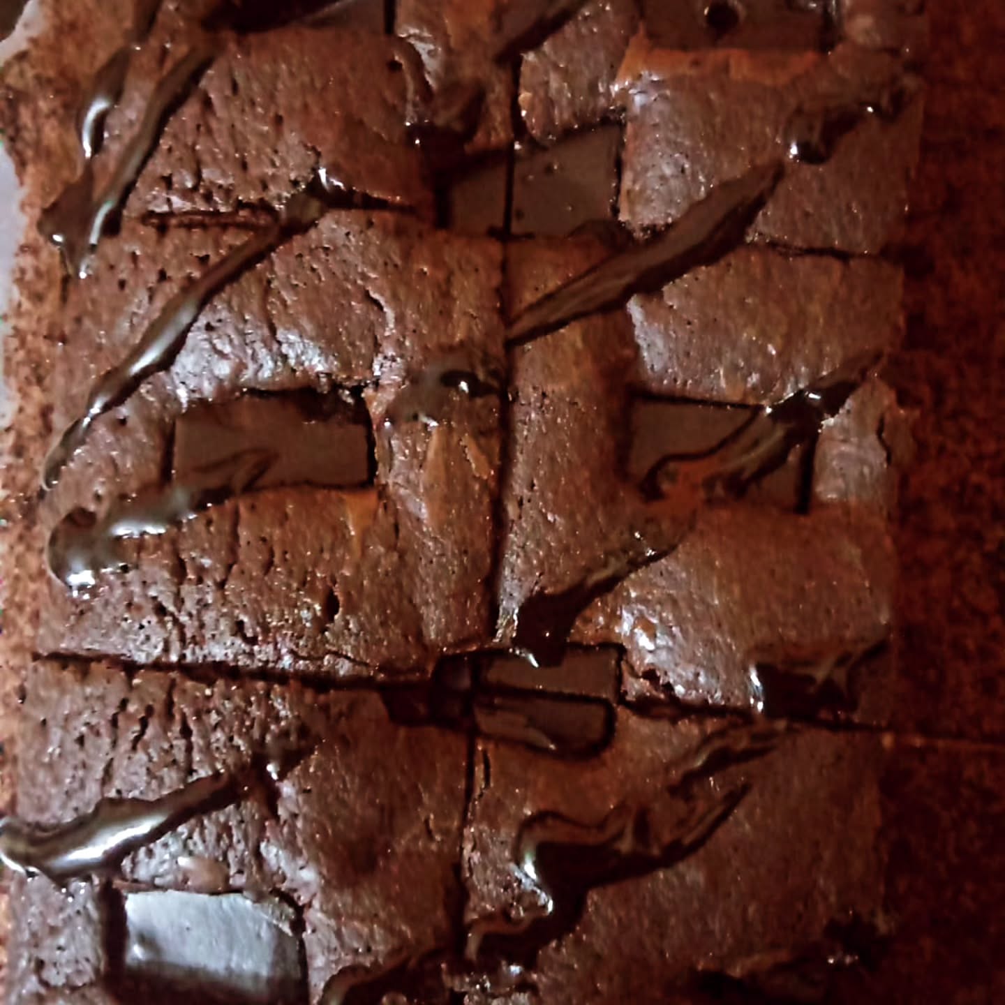 Classic fudgy brownie squares with chocolate drizzle